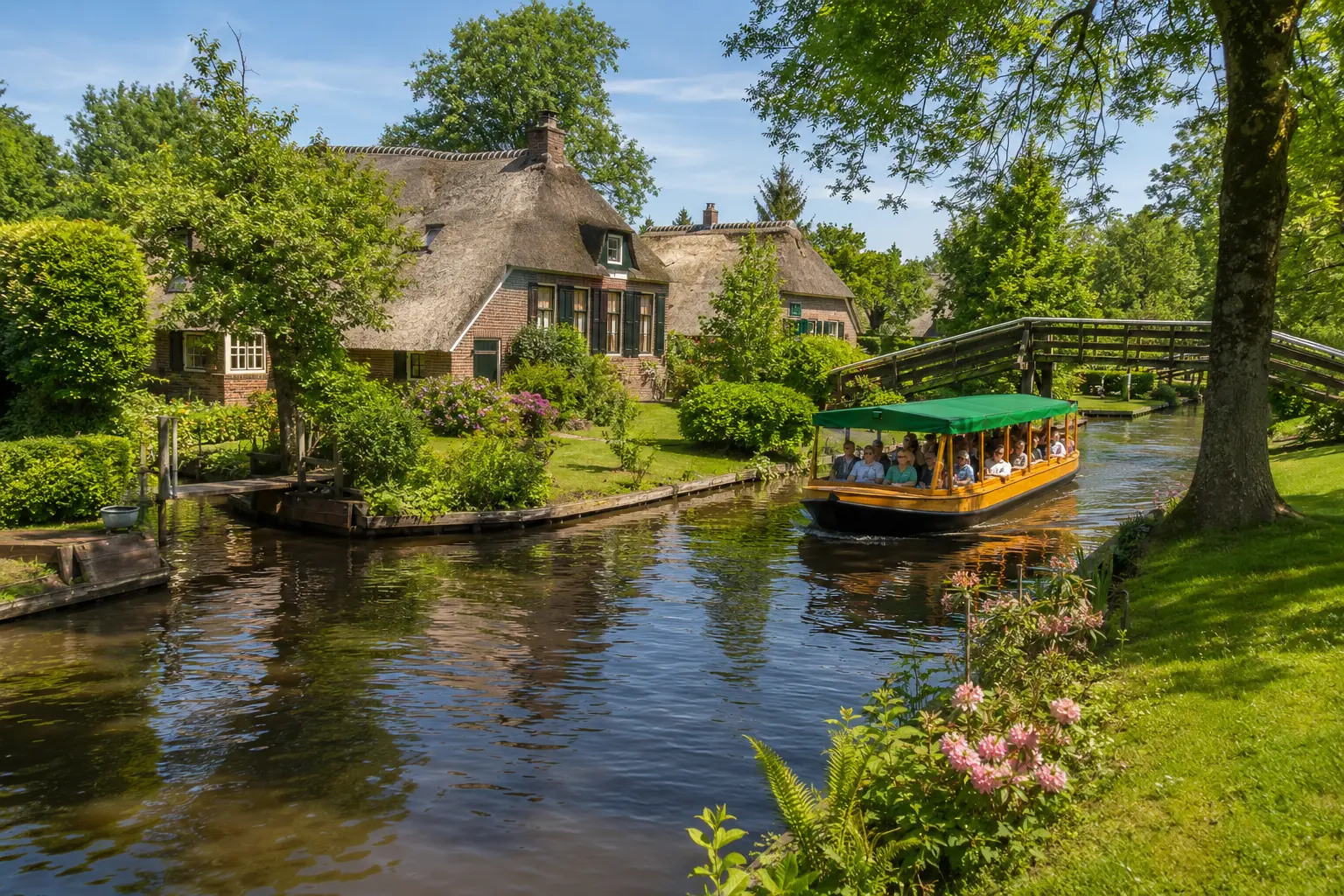Passengers enjoying a covered canal cruise through the picturesque waterways of Giethoorn in the Netherlands.